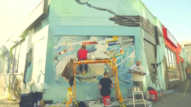 Seattle street artist John Osgood paints mural for New Amsterdam Vodka "It's Your Town" campaign