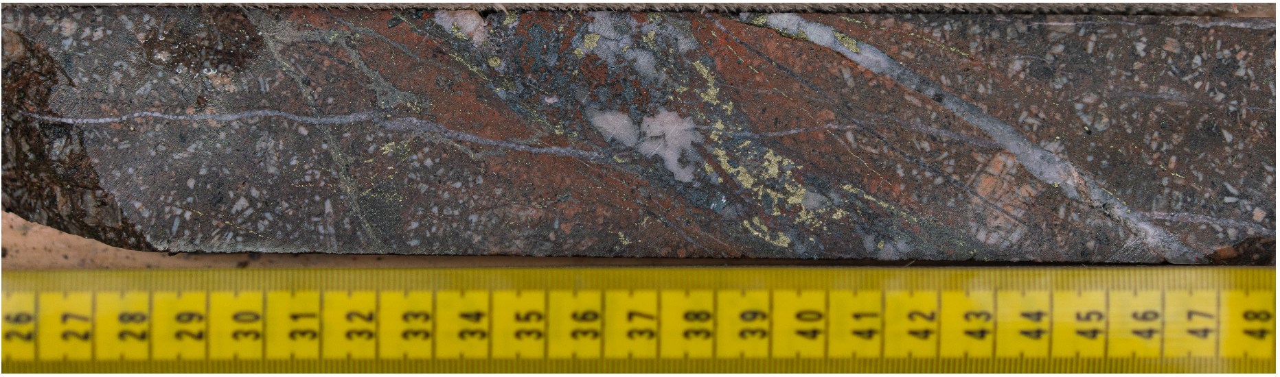 Figure 3: Photo taken of stock-work hosted and disseminated chalcopyrite-bornite within potassic alteration assemblage of secondary K-feldspar and “shreddy” biotite. (CNW Group/Crystal Lake Mining Corporation)