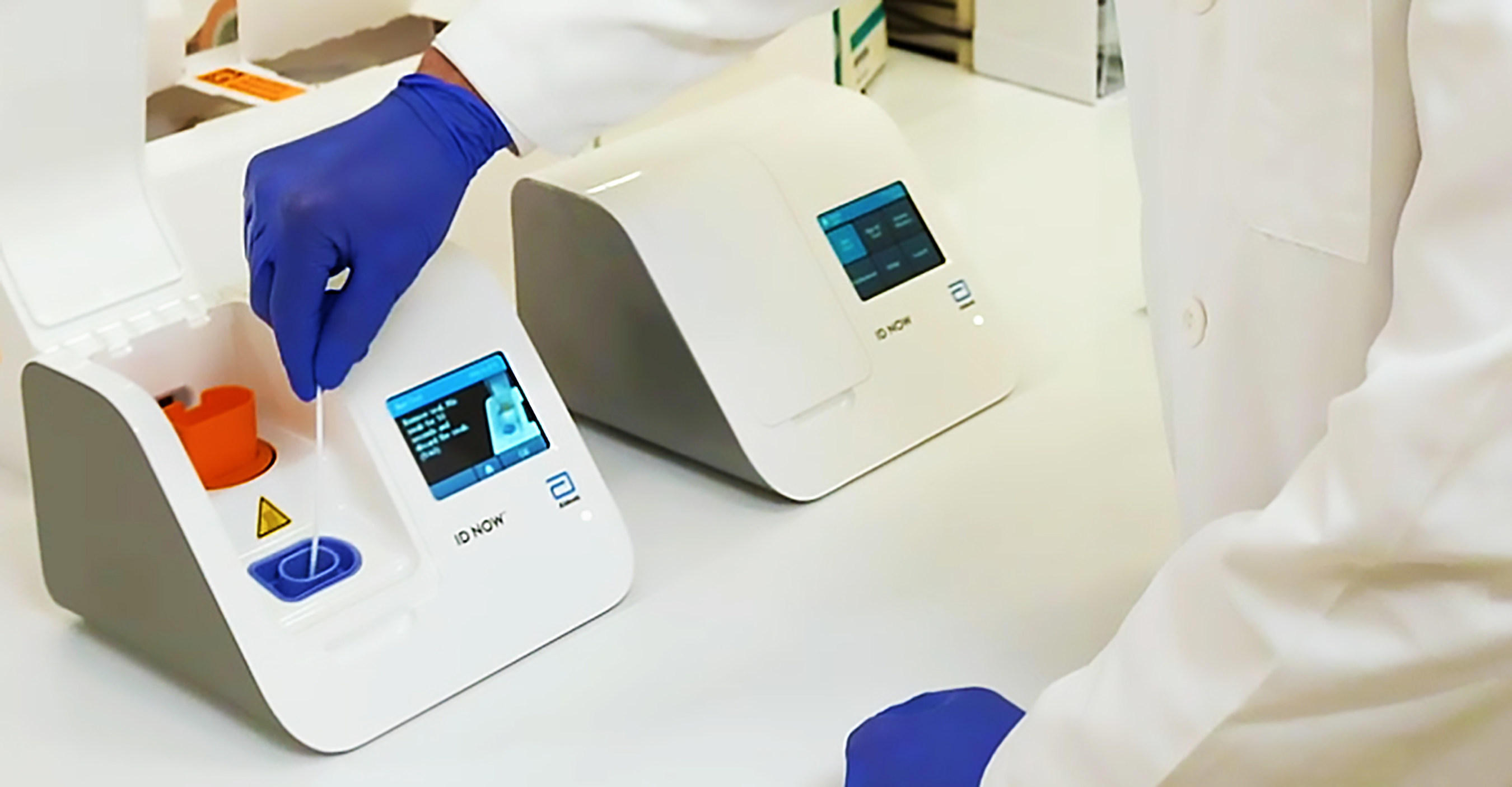 Abbott Laboratories Unveils 5-Minute COVID-19 Test in the US: A phhoto of the ID NOW COVID-19 tests 