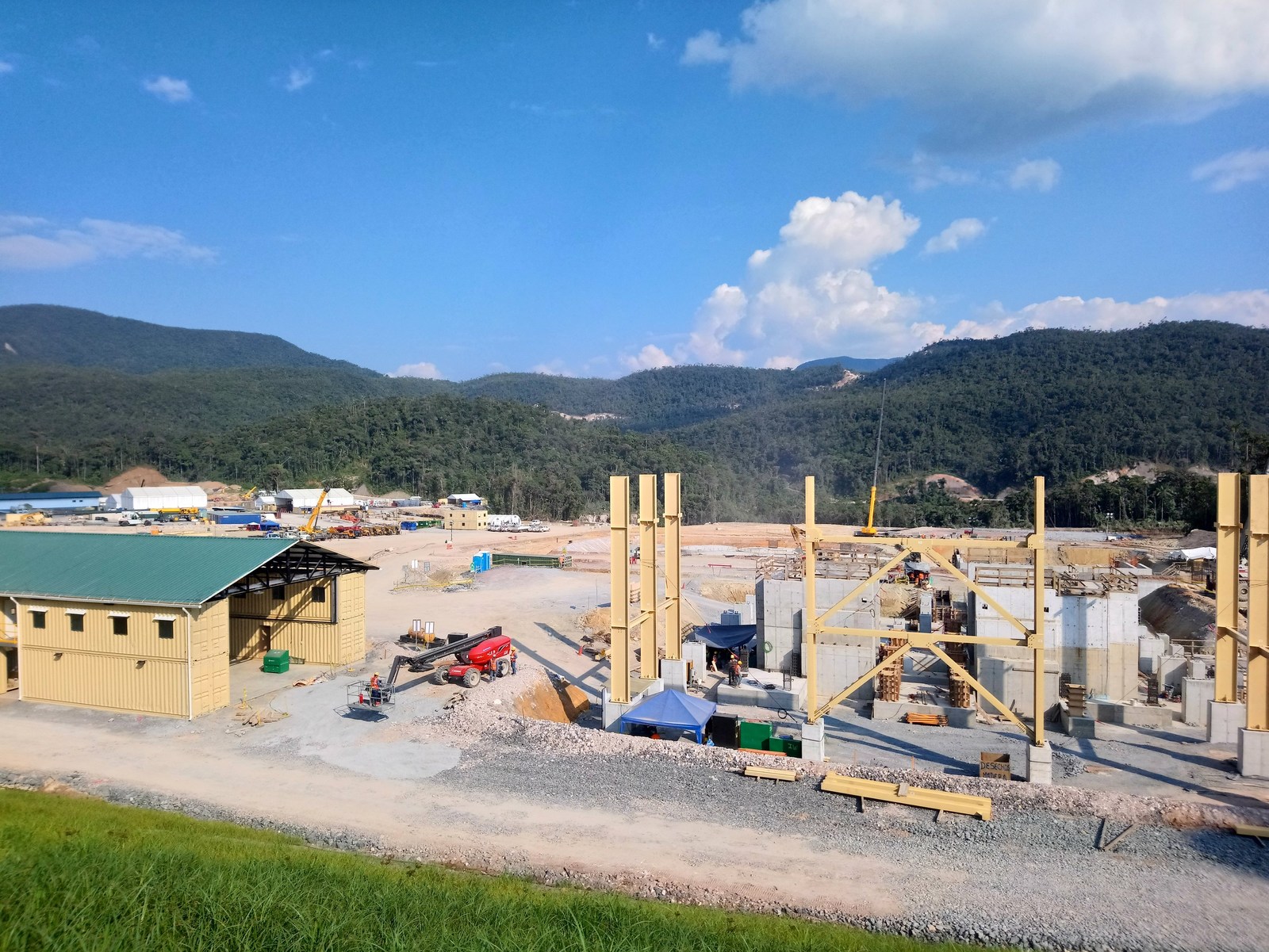 Figure 3. Grinding building steel erection is underway