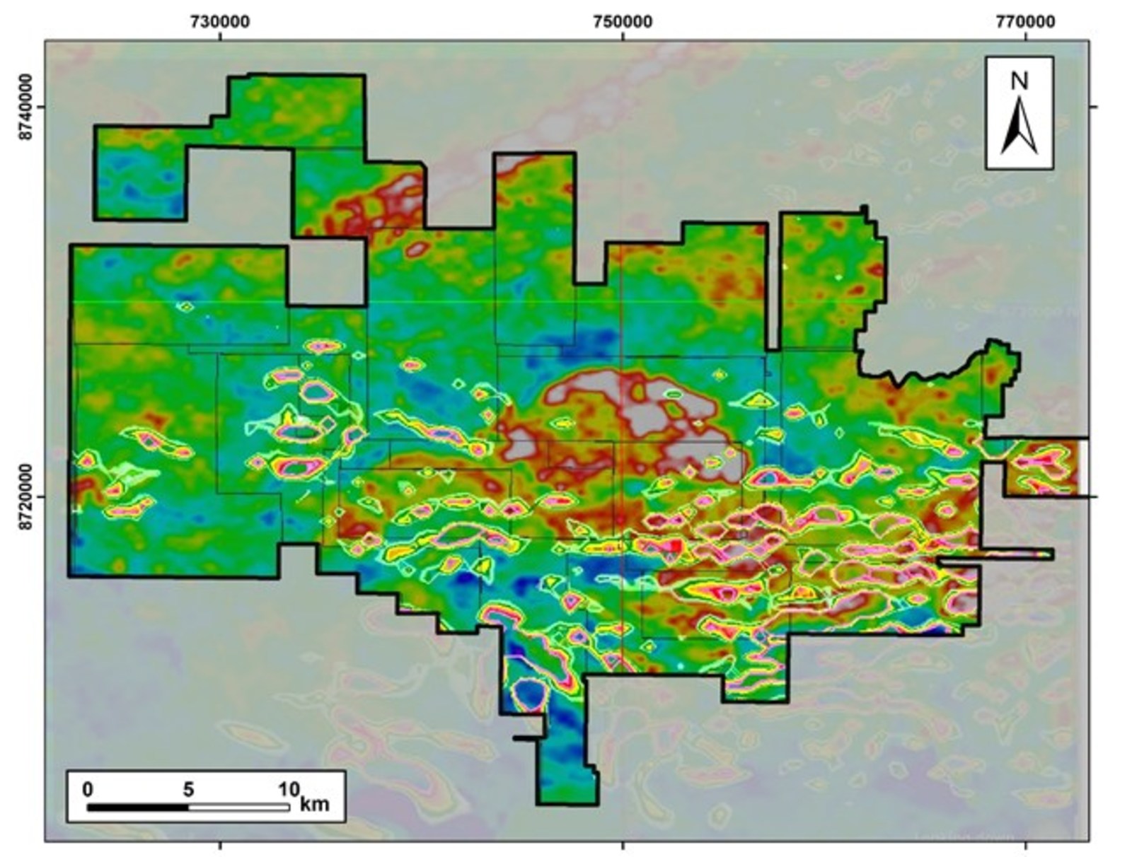 Fig. 1: Regional map of magnetic anomalies superimposed on total count radiometrics. The progressively "warmer" colours represent shells of increasing magnetic intensity.